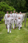 Group of groomsmen wearing light grey wedding suits hired from Outfit78 Chippenham, serving Bath and Swindon weddings.