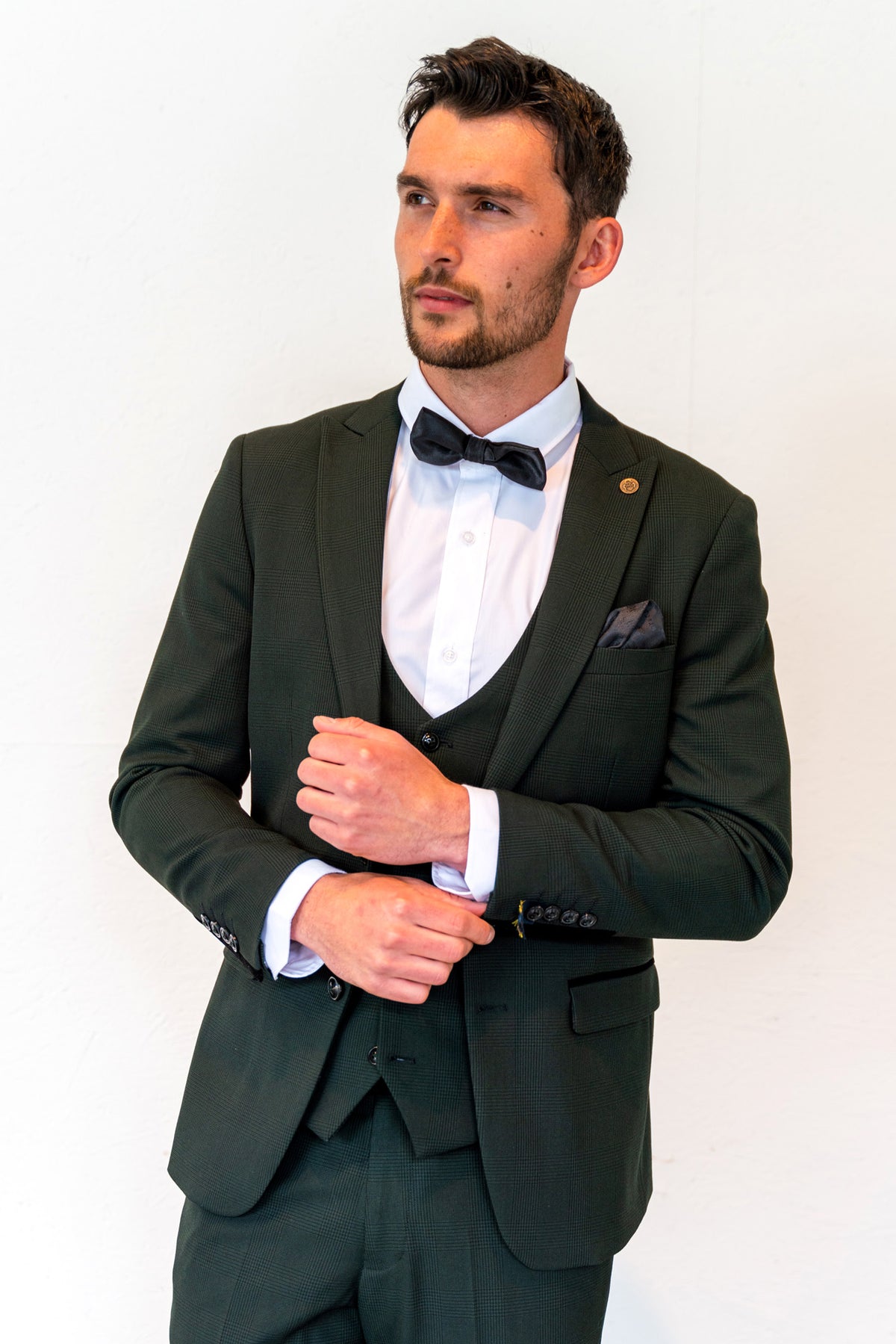 Man wearing Marc Darcy Bromley Olive Green velvet blazer, stylish evening wear hire for parties in Wiltshire